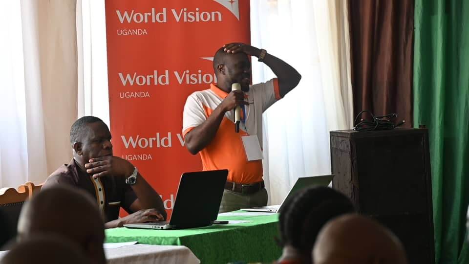 Stephen Baluku, Project Manager, FMNR Catalyst Project, World Vision speaking to Participants during the Symposium.