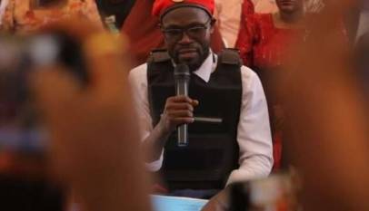 Lawyer Nalukoola Grabs NUP Party Flag