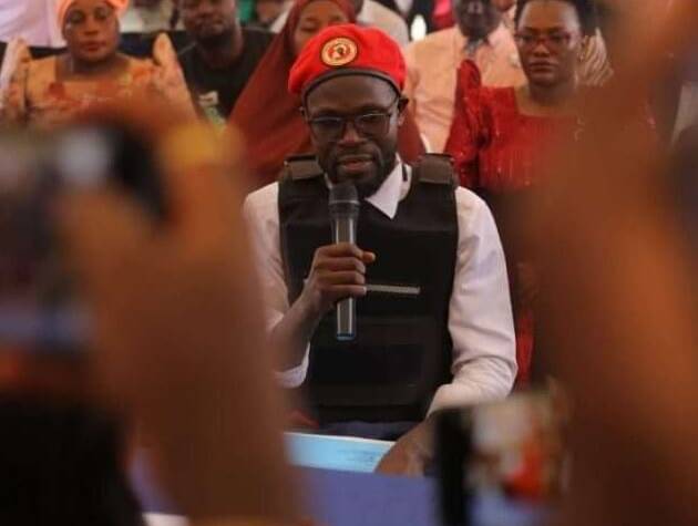 Lawyer Nalukoola Grabs NUP Party Flag