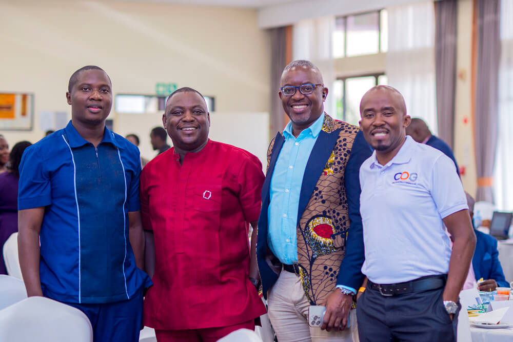 From the L-R Eric Aphia- Country Head ESG Institute Ghana, Paul Mwirigi- Head of Strategy at COG (in white) with other two attendees at the ESG Summit